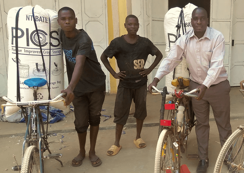 Community members with bicycles at AVC Burundi