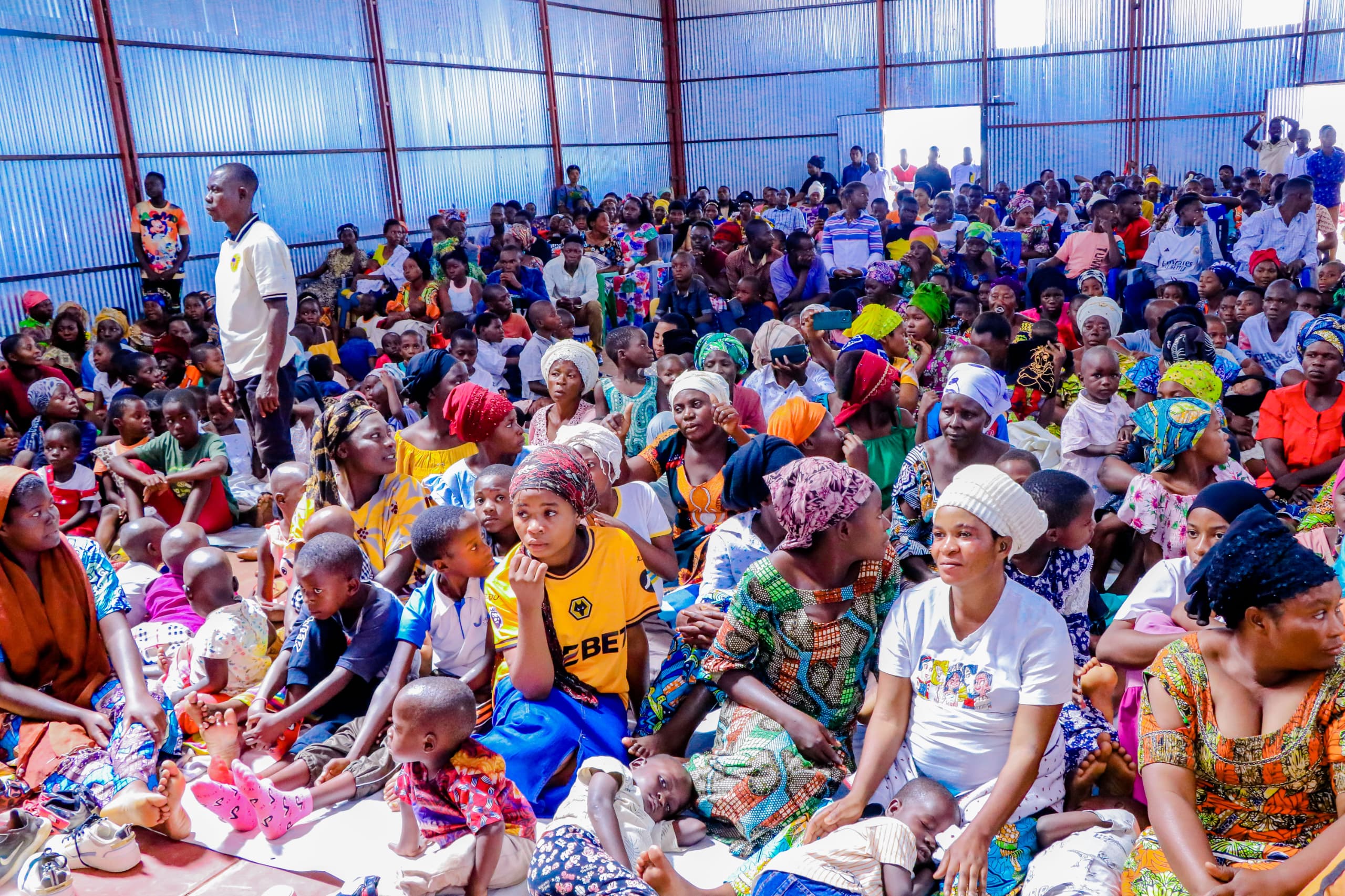 Women engaged in sewing workshop activities
